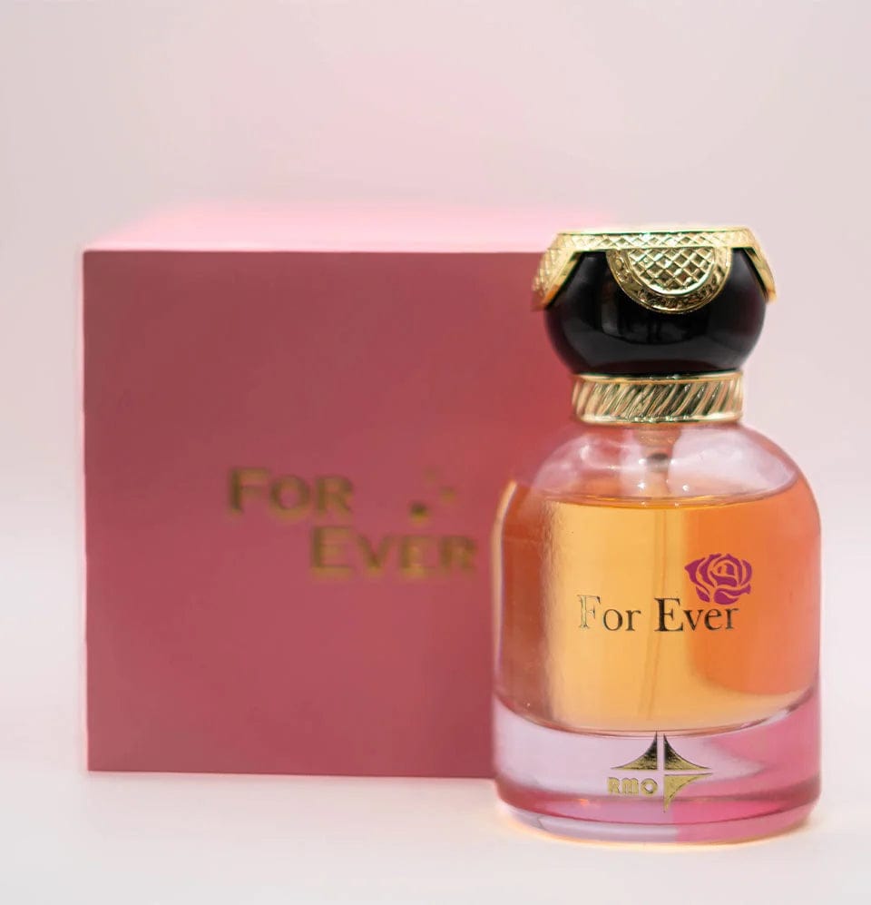 Forever Perfume with the Pink Box in background by Reeh al madinah